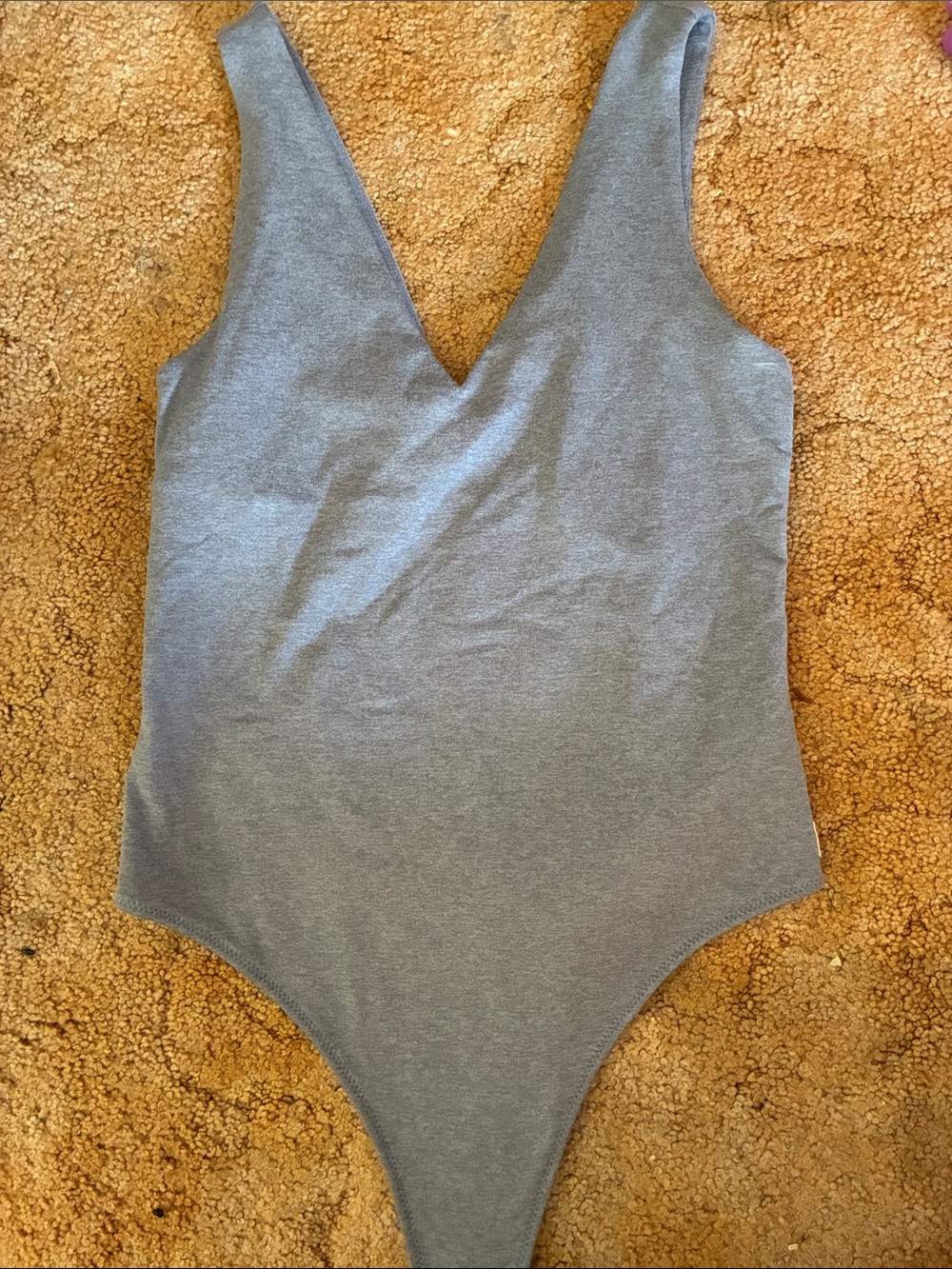 Vuori Heather Slate Blue Bodysuit with Center Seam